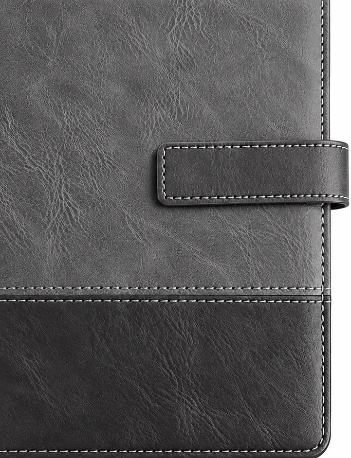 Black executive notebook: magnetic strap and stitching