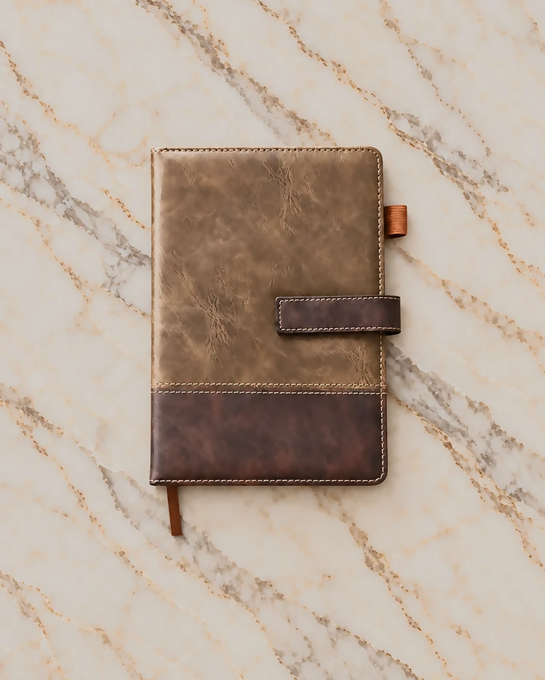 Branded executive notebook in brown leather-look with strap closure and pen loop
